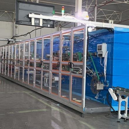 Semi servo sanitary pads making machine photo 5